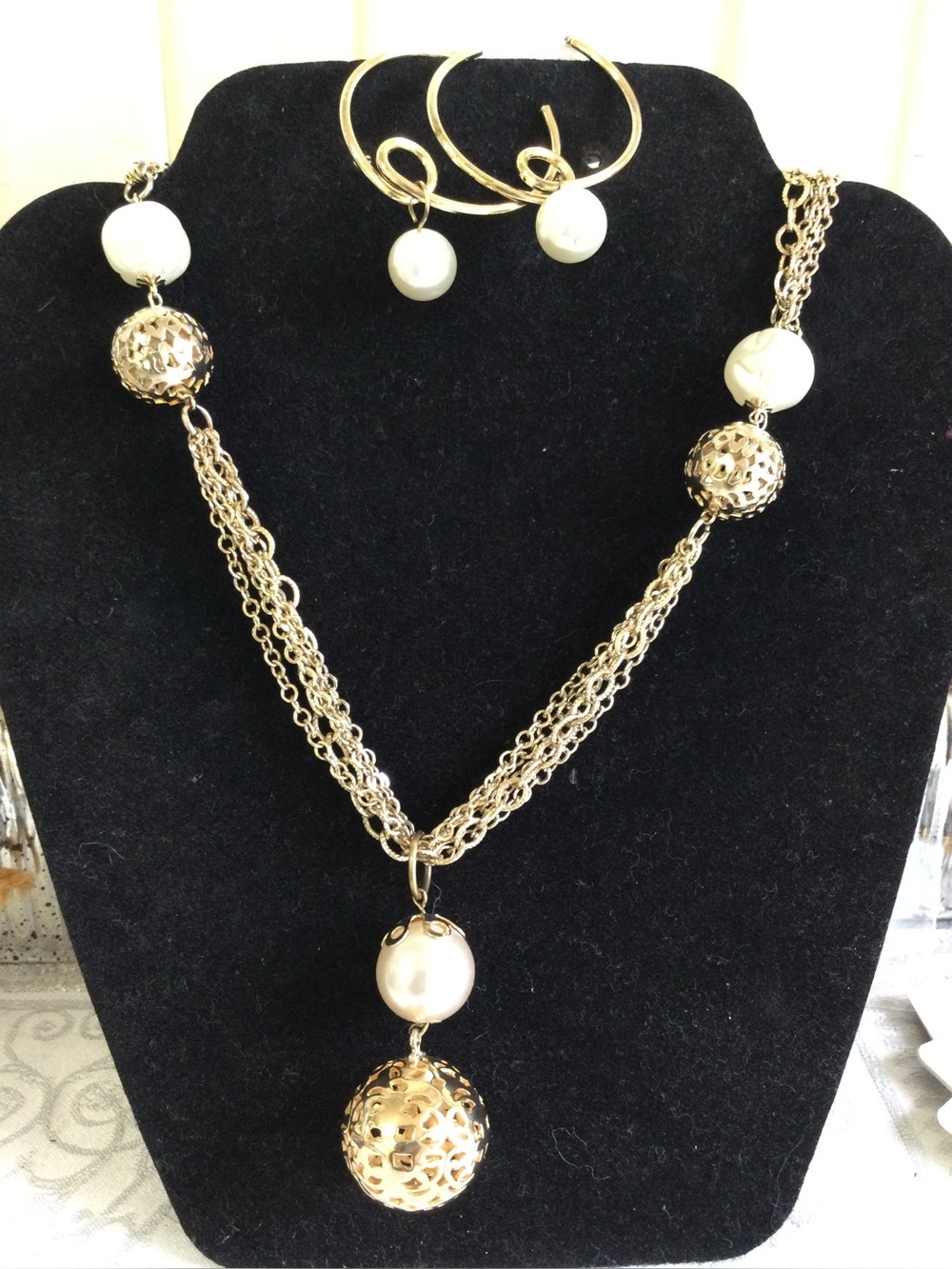 Gold and Pearl Multi-Chain Pendant Necklace with Hoop Earrings